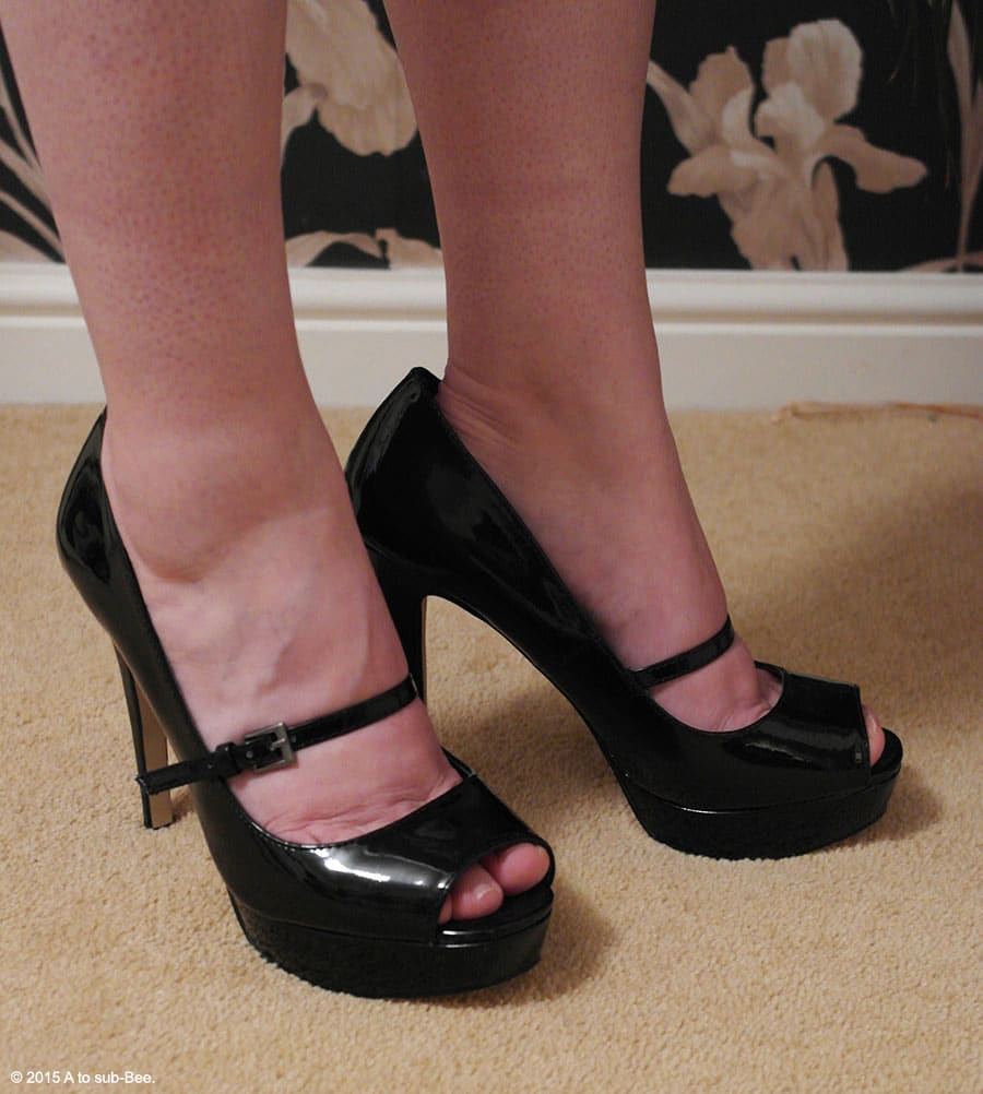 More shoe porn, this time its black high heeled peep toe shoes