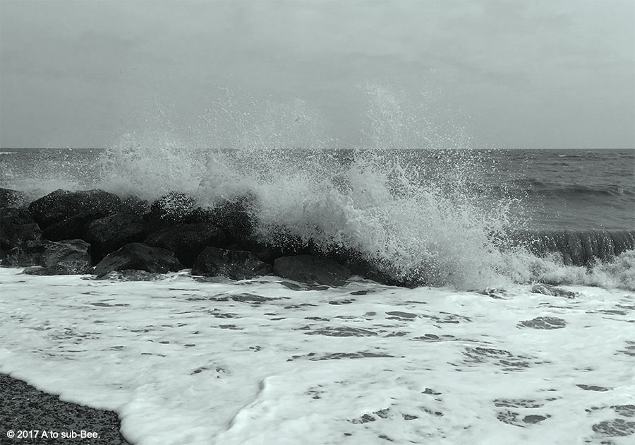 Waves crashing down on a beach