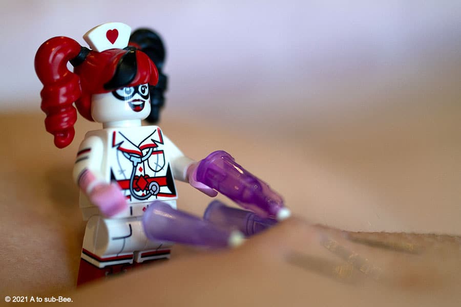 Nurse Harley inserts the needle into Bee's bottom